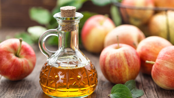 Apple Cider Vinegar bottle and apples - Life Pharmacy Blog